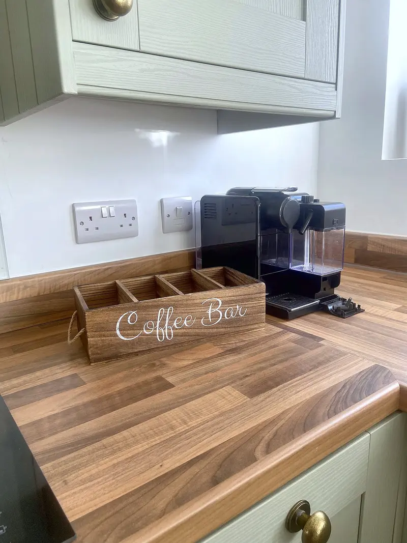 Coffee machine and coffee bar box on the kitchen worktop